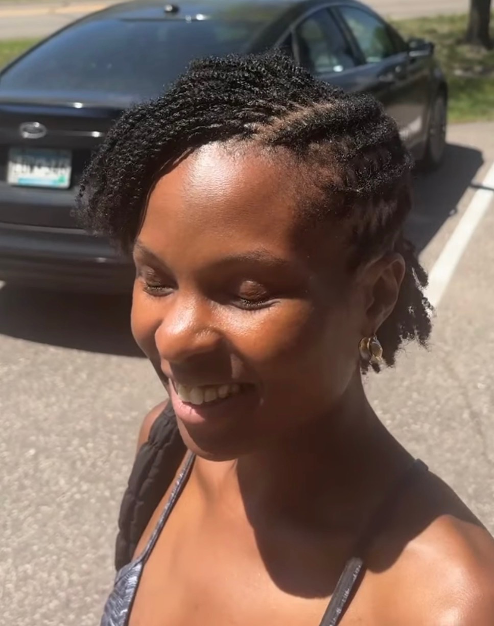 Box braids with high fluffy pigtails